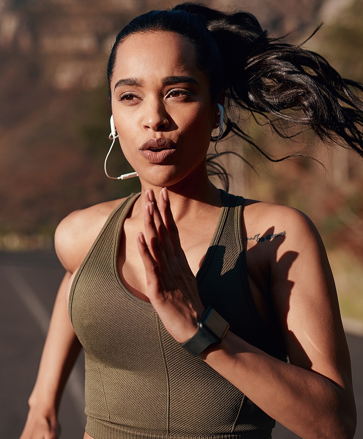 Green leaf texture with prominent veins.