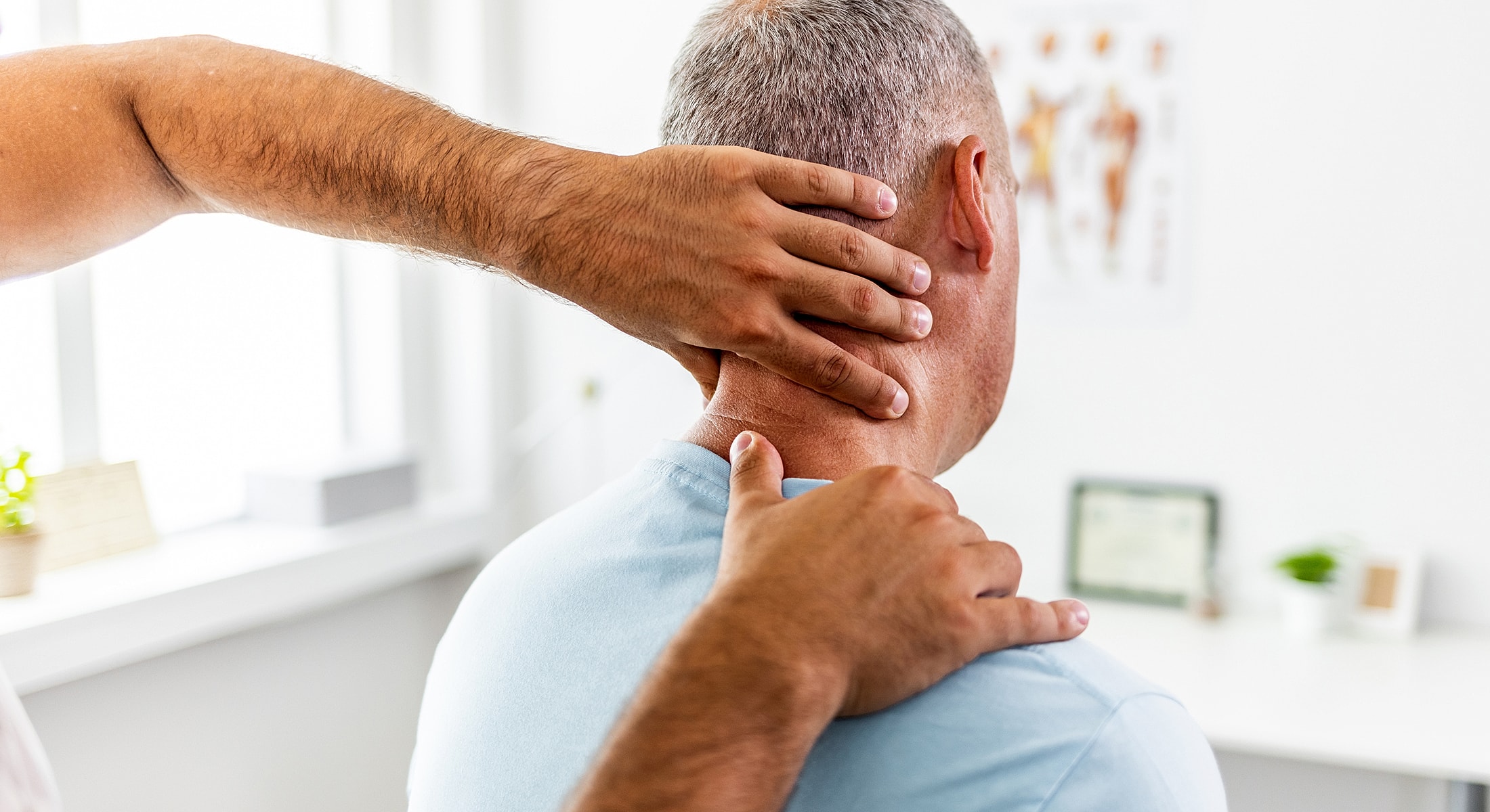 Neck massage therapy session in a clinic.